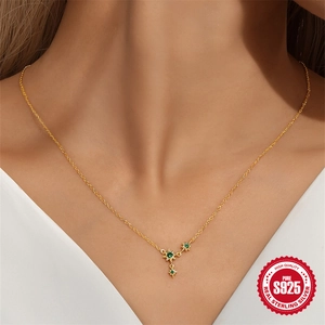 Classic S925 sterling silver star necklace in gold finish with three green gemstones