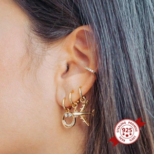 Chic 925 silver airplane and smiley face gold earrings set worn on ear model