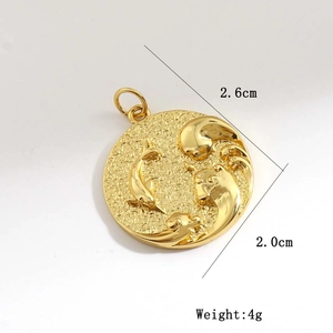 Detail showing dimensions of golden embossed dolphin pendant with 2.6cm height and 2.0cm width
