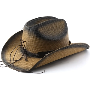 Close-up of a woven western cowboy hat featuring gradient brown and black straw textures