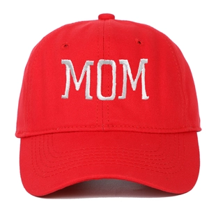 Close-up of white MOM embroidery on red cotton twill fabric of the baseball cap