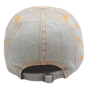 Detail of light blue denim newsboy cap back view with orange fishbone embroidery
