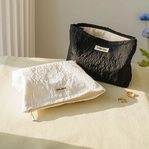 Chic black and white rose jacquard makeup bags with textured fabric and large capacity