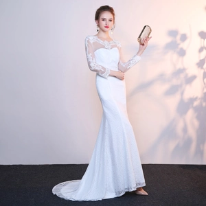 Elegant white lace long sleeve mermaid wedding dress with sheer mesh and train