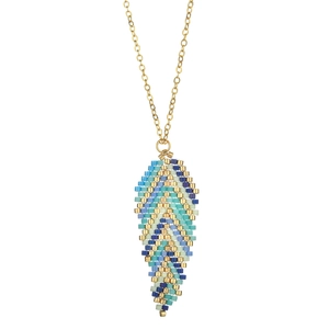 Detail of bohemian gold chain necklace featuring a colorful beaded leaf pendant