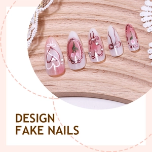 Sweet pink gradient press-on nails with 3D bows, pearls and hand-painted tulip art