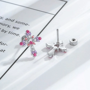 Silver cross stud earrings with pink and purple cubic zirconia and screw back closures