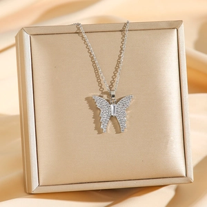 Silver butterfly pendant necklace with full cubic zirconia pave and rectangular stone