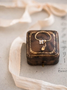 Japanese style adjustable chain ring with white flower and gold heart pendant