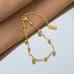 Minimalist gold titanium steel bead bracelet with lobster clasp and adjustable chain