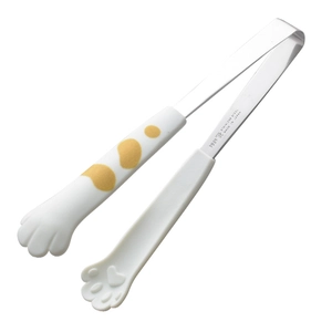 Cute cat paw food tongs with stainless steel tips and yellow spotted handle on white background