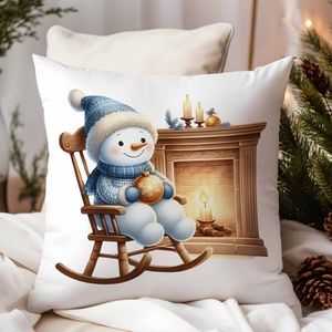 Gros plan sur l'imprimé bonhomme de neige d'une housse de coussin de Noël festive