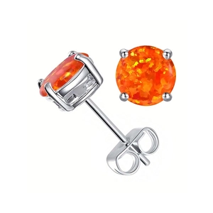 Macro detail of 6mm orange fire opal stud earrings with 4-prong silver-plated setting