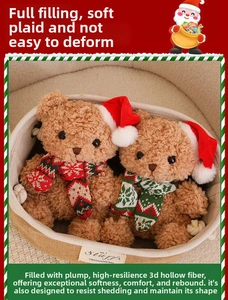 Close-up of Christmas teddy bears in a basket with red hats and knitted scarves
