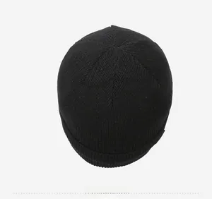 Top view of a black ribbed knit beanie featuring thick warmth for winter outdoor wear