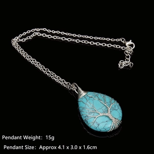 Handmade wire wrapped Tree of Life pendant necklace with turquoise teardrop crystal