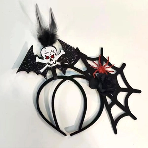 Detail of Halloween headbands featuring skulls, spiders, and feathers for parties