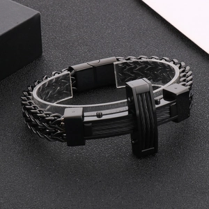 Detail view of hip-hop cross steel bracelet featuring dual mesh chains and magnetic clasp