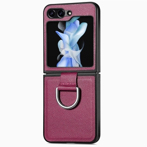 Detail of dark pink litchi grain PU leather phone case with silver metal ring holder