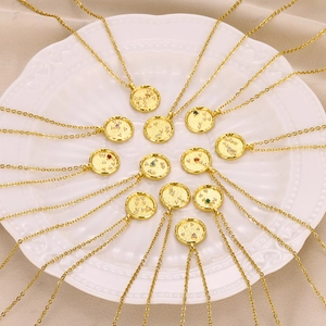 18K gold plated coin necklace featuring 12 zodiac signs and colorful cubic zirconia stones