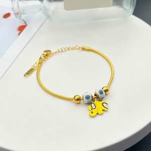 Golden titanium steel snake chain bracelet with evil eye beads and elephant pendant charm