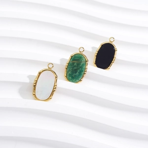 Three elegant French oval pendants in white, green, and black stones with gold-plated edges