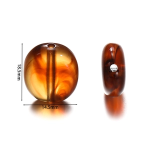 Detail of amber acrylic irregular beads with 18.5x14.5mm dimensions for DIY jewelry