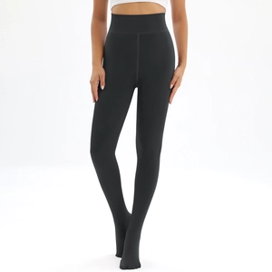 Detail of high waist thermal fleece leggings showing a slimming fit and seamless matte finish