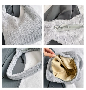 Detail of light grey faux fur tote bag with sturdy zipper and plush striped texture