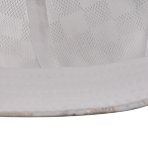 Detailed macro view of white checkered fabric and reinforced stitching inside the cap