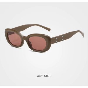 Cat-eye brown sunglasses with distinctive silver diamond rivets shown from 45-degree angle
