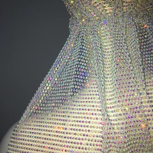 Close-up of elastic mesh headband featuring sparkling AB rhinestones and sheer texture
