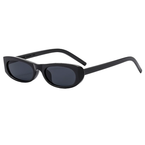 Retro small oval sunglasses for women with black frames and dark UV protection lenses