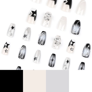 Y2K style press-on nails with silver stars, glitter rhinestones and black gradients