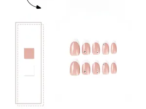 Detailed view of white French tip press-on nails with small rhinestone accents