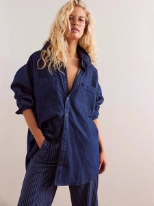 Oversized dark blue denim shirt for women with dual chest pockets and relaxed retro fit