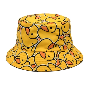 Reversible yellow bucket hat with cute cartoon duck print for sun protection