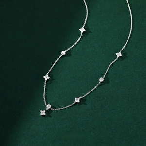 Elegant S925 sterling silver necklace featuring cubic zirconia flowers and round diamonds