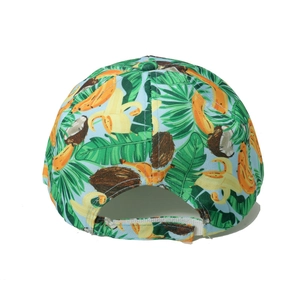 Detail view of tropical fruit print baseball cap with adjustable white velcro strap