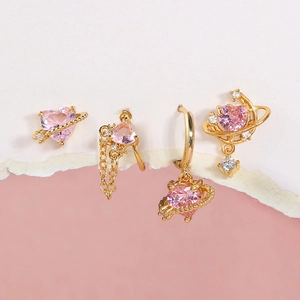 Chic gold heart and planet earring set with pink crystals for a sweet summer style