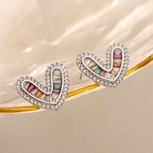 Silver heart stud earrings with colorful baguette zircons and white stone halo on shell