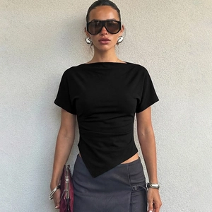 Close-up of slim-fit black short-sleeve top with unique asymmetrical pointed hem detail