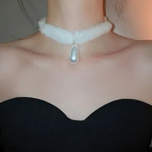Winter elegant white plush choker featuring a large teardrop pearl pendant for women