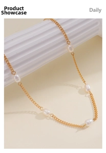Detailed close-up of 18k gold-plated chain featuring five elegant white freshwater pearls