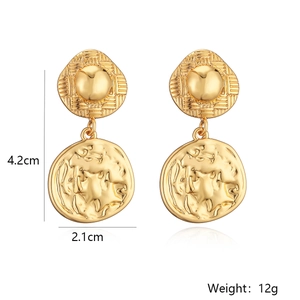 Detail showing 4.2cm height gold geometric earrings with weight specifications