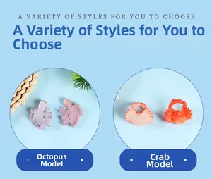 Detailed close-up of miniature purple octopus and orange crab PVC seafood models