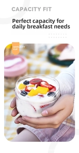 Close-up of portable yogurt bowl with mango and berries during an outdoor picnic scene