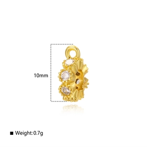 Detailed view of 10mm gold zircon charm with dimensions and 0.7g weight info