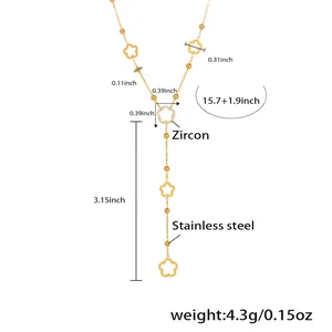 Detail of gold stainless steel Y-necklace with zircon flower and bead accents