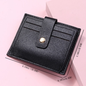 Detail showing ultra-thin black leather card holder dimensions 10.5cm by 8.5cm with gold buckle